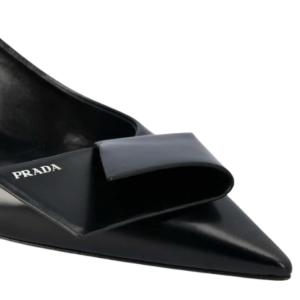 Folded logo decorated toe slingback heel