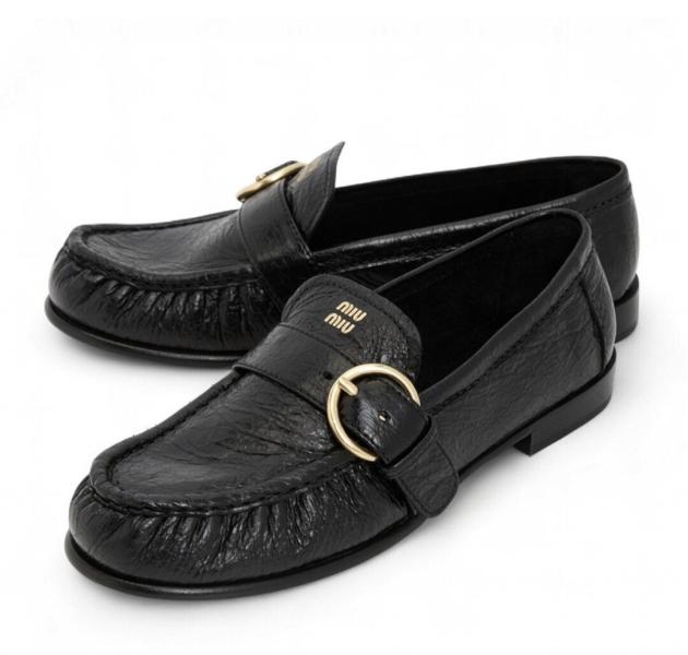 Miu Miu Black leather loafers with crinkled vintage-effect 