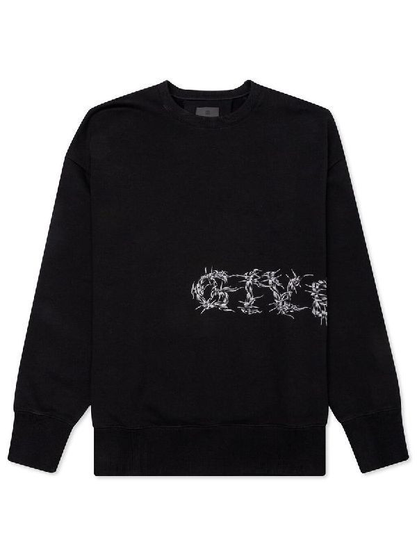 Barbed wire logo over sweatshirt