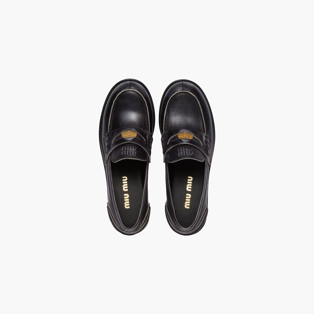 Leather penny loafers in Black