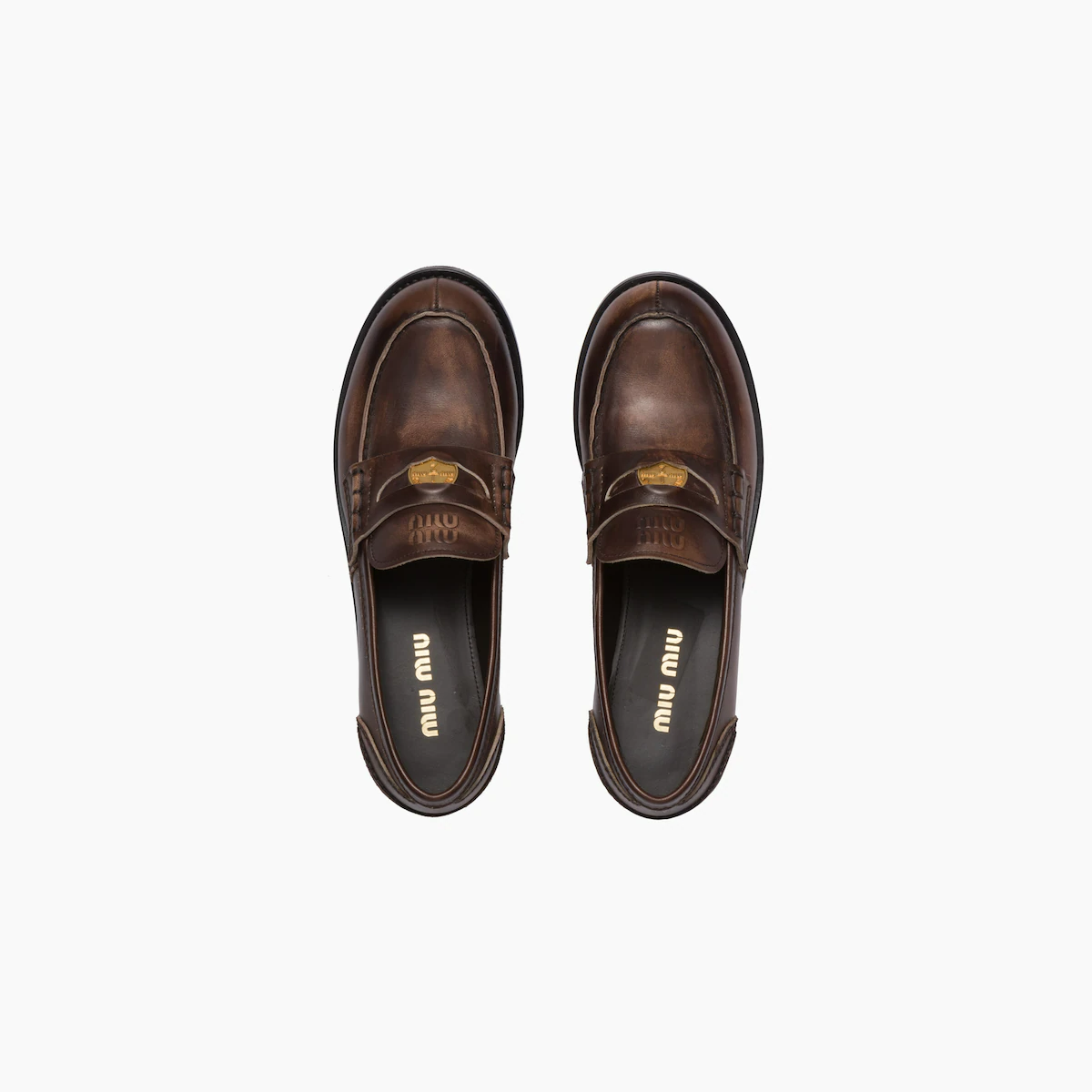 Leather penny loafers in Brown