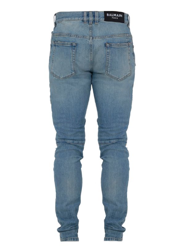 Slim-cut distressed denim trousers