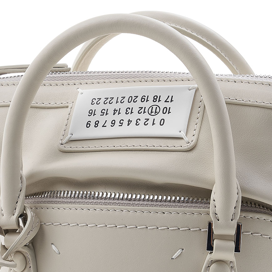 stitch logo shoulder bag