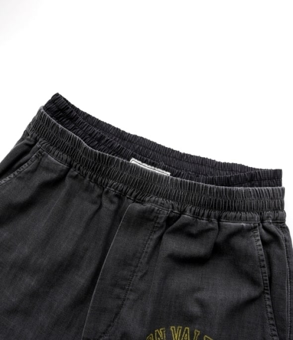 MAISON VALENTINO LOGO PRINTED DENIM PANTS