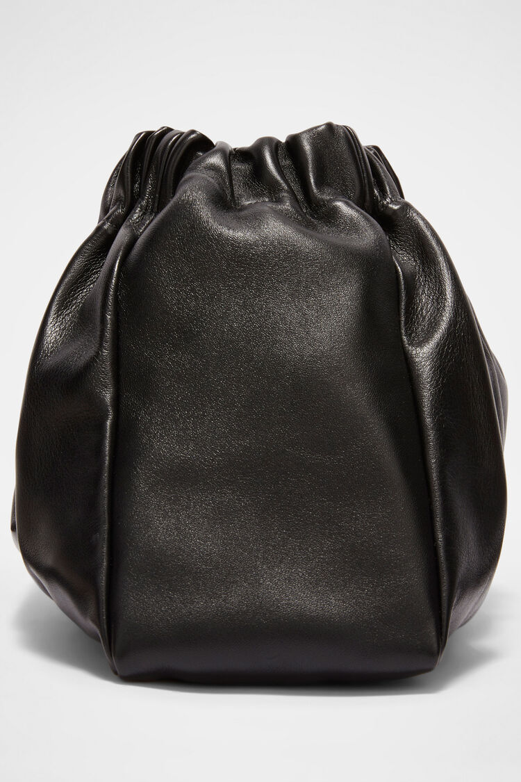 Jil Sander embossed logo detail leather clutch bag