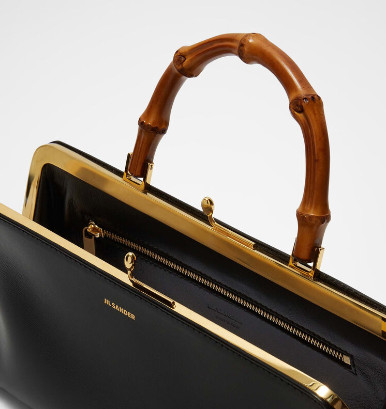 Small leather handbag with metal frame and embossed Jil Sander logo