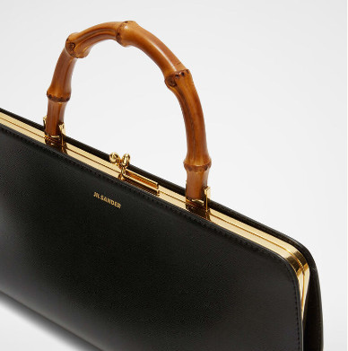 Small leather handbag with metal frame and embossed Jil Sander logo