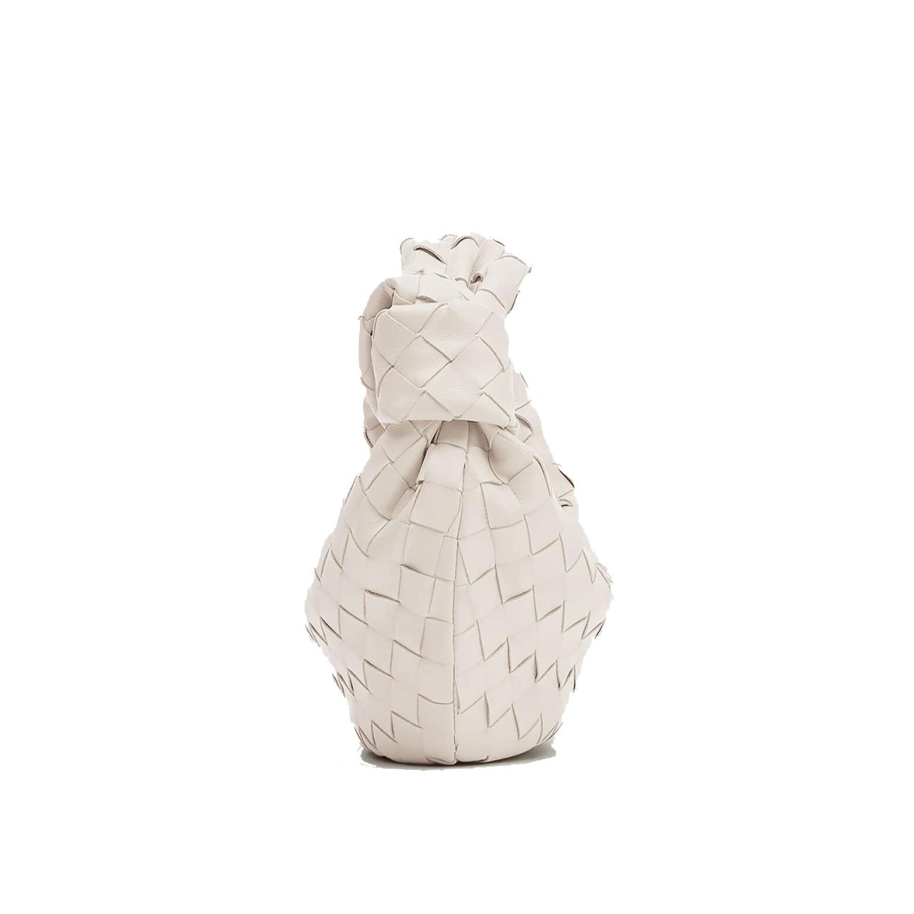 Crafted from sheepskin with intrecciato weave Choke white