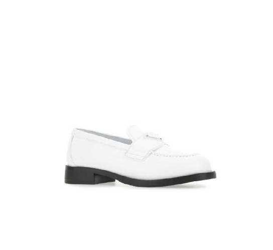 Triangular logo-embellished leather loafers