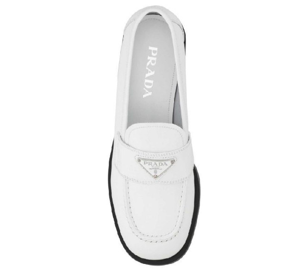 Triangular logo-embellished leather loafers