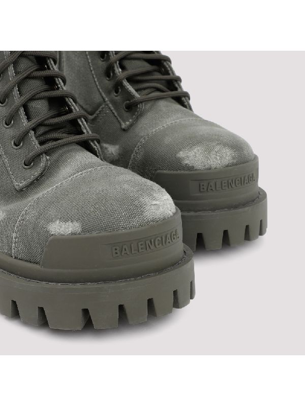 Distressed lace-up boots