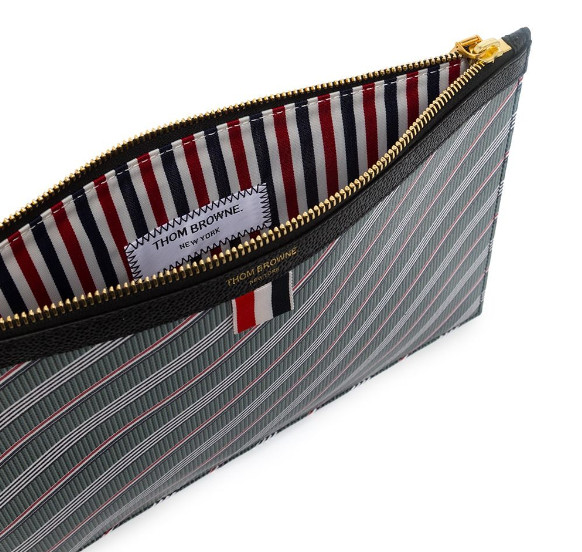 Additional production Monogram Coated RWB Stripe Clutch Small