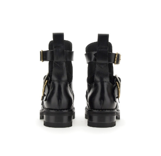 Black leather buckle boots