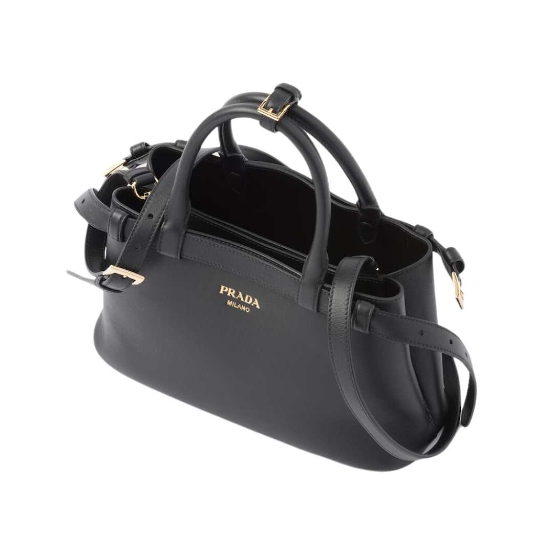 Small leather handbag with belt