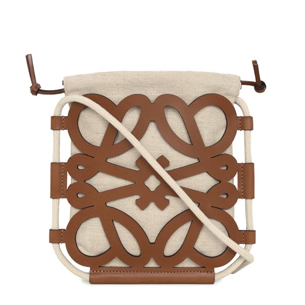 Tan Ecru Anagram Cutout Cross Bucket Bag